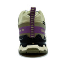 A rear view of the Salomon Womens XA Pro 3D V9 GORE-TEX Trail Shoe in beige, purple, and olive green shows waterproof protection, a striped pull tab, and visible PRO 3D and SALOMON text on the heel.