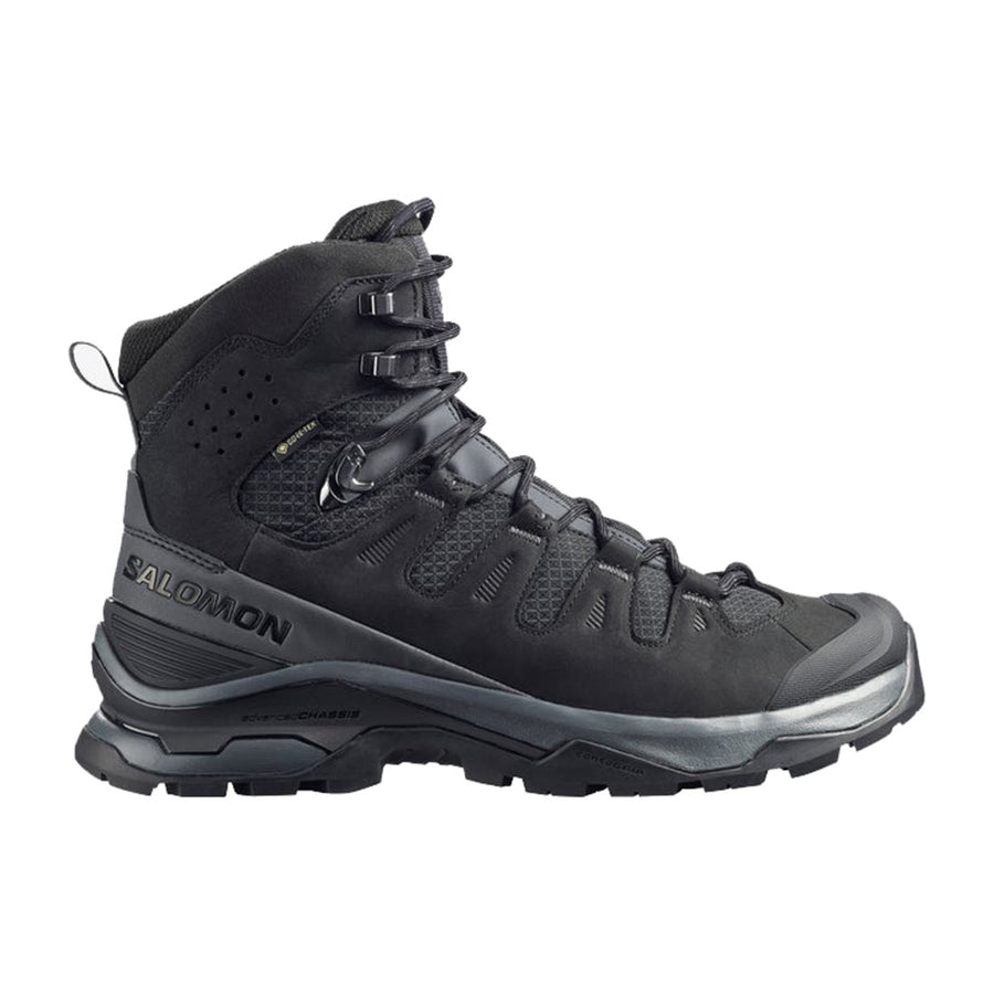 The Men’s Quest 5 GORE‑TEX Hiking Boot by Salomon is black with high ankle support, sturdy tread, lace-up closure, and 4D Advanced Chassis technology, shown in side profile on a white background.