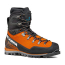 The Scarpa Men’s Mont Blanc Pro GTX is an orange and black hiking boot with black laces, metal eyelets, a rugged sole, and “Scarpa” printed in white on the side. Inspired by technical mountaineering boots, it features reinforced ankle support and detailed stitching—making it ideal for challenging terrain.