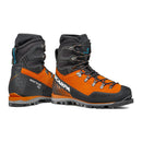Pair of orange and black high-ankle Scarpa Men’s Mont Blanc Pro GTX technical mountaineering boots featuring rugged soles, metal eyelets, and reinforced heels, positioned to display both side and back details.