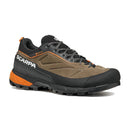 The Men’s Rapid XT GORE-TEX by Scarpa is a brown and black outdoor hiking shoe with orange accents and thick tread, featuring the Scarpa logo on the side. This waterproof approach shoe is equipped with GORE-TEX ePE technology for reliable protection in any weather.