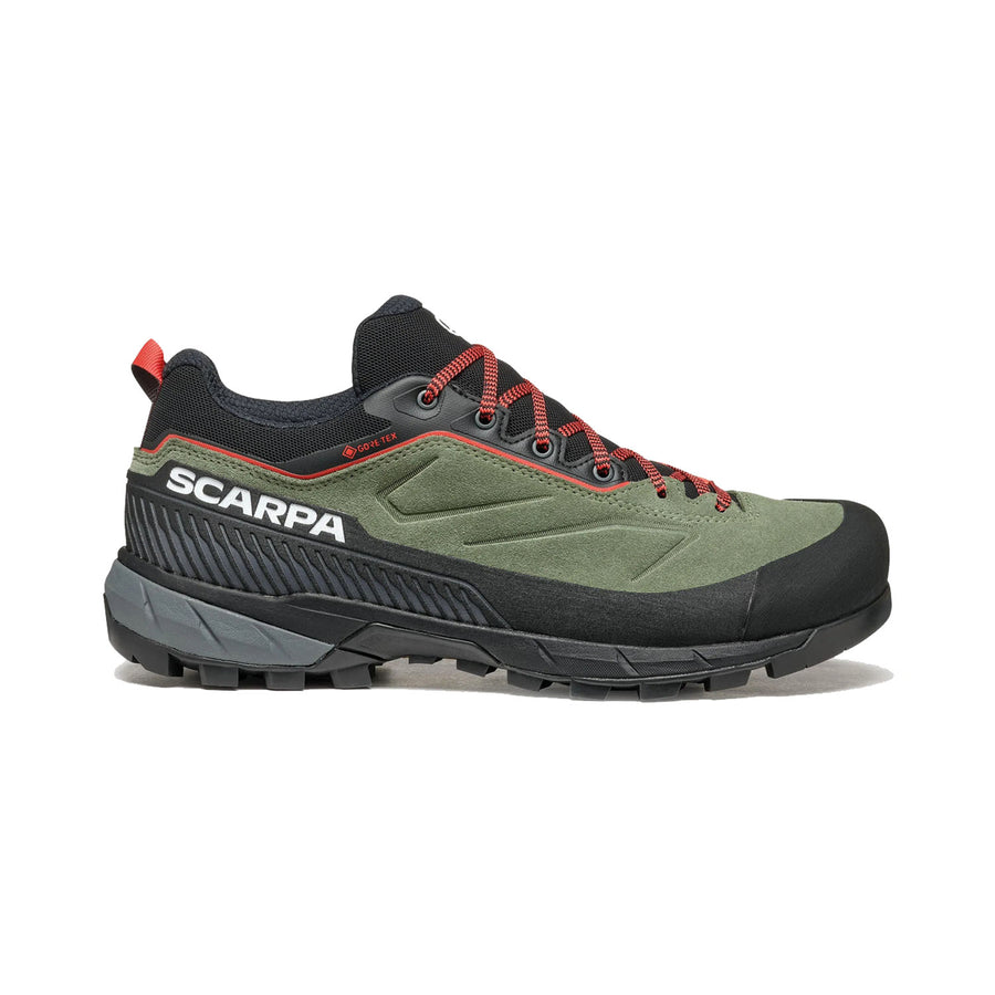 A green and black Scarpa Women’s Rapid XT GORE-TEX approach shoe with red laces, a rugged Vibram Megagrip sole, and Scarpa branding on the side, viewed from the left.