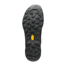 The Scarpa Women’s Rapid XT GORE-TEX features a black shoe sole with a rugged, geometric tread pattern and a yellow oval Vibram logo at the center. The sole incorporates high-performance Vibram Megagrip technology for superior traction. Designed as a women’s waterproof approach shoe, the sole is shown from the bottom against a white background.