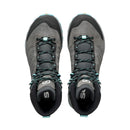 A pair of Scarpa Women’s Rush TRK GORE-TEX hiking boots in gray with teal accents and black laces, viewed from above. These waterproof boots feature black padded collars and an “S” logo on each tongue.
