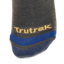 Close-up of a sock with 'Trutrek' branding on a white background