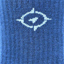 Close-up of blue socks with a white logo on a textured background